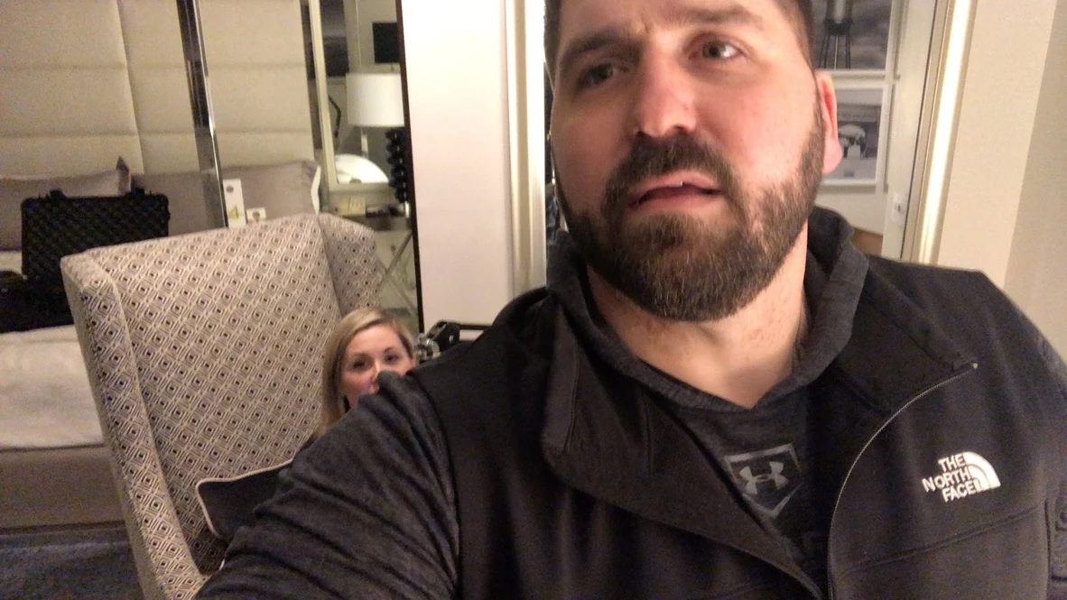 Bob Ruff in the foreground with Jennifer Neeley visible behind him during their recording session.
